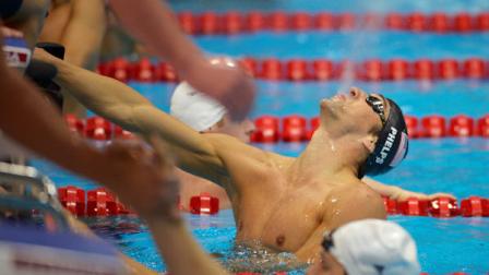 United States Michael Phelps, right, celebrates winning gold in the mens 4x200-meter freestyle relay swimming final at the Aquatics Centre in the Olympic Park during the 2012 Summer Olympics in London, Tuesday, July 31, 2012. (AP Photo/Mark J. Terrill)