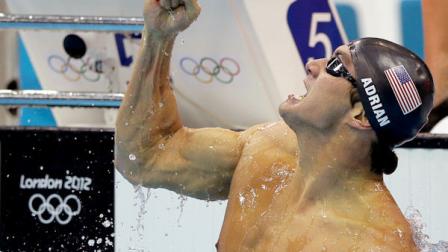 United States Nathan Adrian celebrates his gold medal win in the mens 100-meter freestyle swimming final at the Aquatics Centre in the Olympic Park during the 2012 Summer Olympics in London, Wednesday, Aug. 1, 2012. (AP Photo/Matt Slocum)