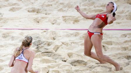 United States Kerri Walsh Jennings, left, and Misty May-Treanor, celebrate after defeating April Ross and Jennifer Kessy in a womens gold medal beach volleyball match at the 2012 Summer Olympics, London, Wednesday, Aug. 8, 2012. (AP Photo/Jae C. Hong)