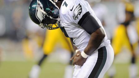 Philadelphia Eagles Michael Vick holds his hand while walking off the field in the first half of an NFL preseason football game against the Pittsburgh Steelers, Thursday, Aug. 9, 2012, in Philadelphia. (AP Photo/Michael Perez)
