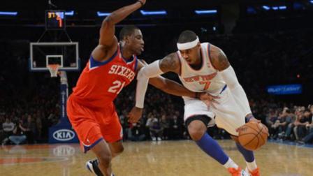 New York Knicks Carmelo Anthony, right, drives on the Philadelphia 76ers Thaddeus Young in the first quarter of the NBA basketball game at Madison Square Garden in New York, Sunday, Nov. 4, 2012. (AP Photo/Henny Ray Abrams)