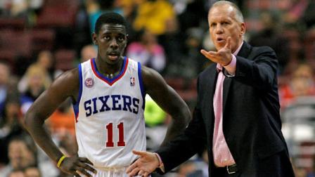 Philadelphia 76ers coach Doug Collins talks to Jrue Holiday (11) during a tine out against the Detroit Pistons in the first half of an NBA basketball game Wednesday Nov. 14, 2012 in Philadelphia. (AP Photo/ H. Rumph Jr)