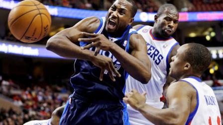 Dallas Mavericks Elton Brand, left, loses the ball as Philadelphia 76ers Jason Richardson, center, and Maalik Wayns defend in the first half of an NBA basketball game, Tuesday, Nov. 27, 2012, in Philadelphia. (AP Photo/Matt Slocum)