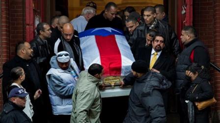 Hector Macho Camachos casket is brought down the steps of St. Cecilias Roman Catholic Church in New York after his funeral Saturday, Dec. 1, 2012. Doctors pronounced Camacho dead on Saturday, Nov. 24, after he was removed from life support at his familys direction. He never regained consciousness after at least one gunman crept up to his car in a darkened parking lot in Puerto Rico and opened fire. (AP Photo/Craig Ruttle)
