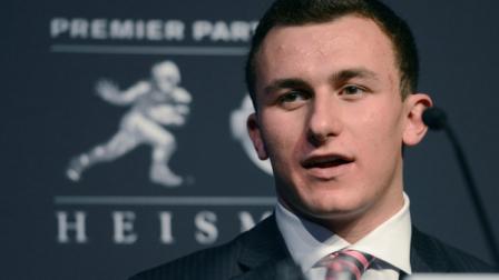 Heisman Trophy finalist Johnny Manziel, a quarterback from Texas A&M, speaks during a news conference prior to the announcement of the trophy winner, Saturday, Dec. 8, 2012, in New York. (AP Photo/Henny Ray Abrams)