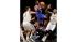 Philadelphia 76ers Jrue Holiday, center, looks...