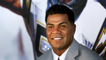FILE - In this Aug. 14, 2006, file photo, former San Diego Chargers football player Junior Seau smiles during a news conference announcing his retirement from pro football in San Diego. Police say Seau, a former NFL star, was found dead at his home in Oceanside, Calif., Wednesday, May 2, 2012, after responding to a shooting there. He was 43.
