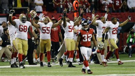 The San Francisco 49ers bench erupts after the NFL football NFC Championship game against the Atlanta Falcons Sunday, Jan. 20, 2013, in Atlanta. The 49ers won 28-24 to advance to Super Bowl XLVII. (AP Photo/John Bazemore)