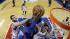 New York Knicks Carmelo Anthony, center, battles...