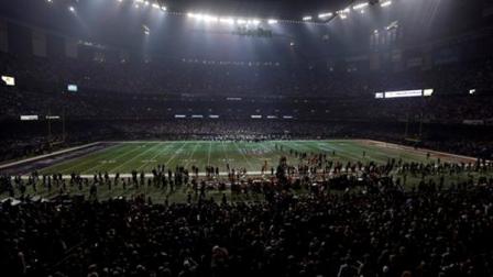 Half the lights are out in the Superdome during a power outage in the second half of the NFL Super Bowl XLVII football game between the San Francisco 49ers and Baltimore Ravens on Sunday, Feb. 3, 2013, in New Orleans. (AP Photo/Marcio Sanchez)