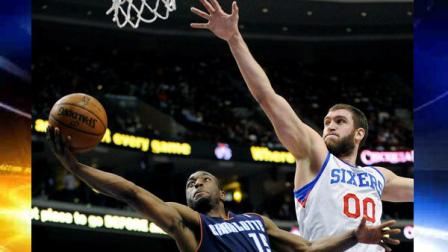 Charlotte Bobcats Kemba Walker (15) drives past Philadelphia 76ers Spencer Hawes (00) during the first half of an NBA basketball game, Saturday, Feb. 9, 2013, in Philadelphia. (AP Photo/Michael Perez)