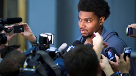 Philadelphia 76ers center Andrew Bynum speaks to reporters at the teams NBA basketball training facility Wednesday, Oct. 24, 2012, in Philadelphia. (AP Photo/Matt Rourke)