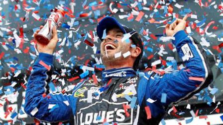 Jimmie Johnson celebrates after winning the Daytona 500 NASCAR Sprint Cup Series auto race, Sunday, Feb. 24, 2013, at Daytona International Speedway in Daytona Beach, Fla. (AP Photo/Terry Renna)