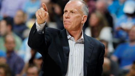 Philadelphia 76ers head coach Doug Collins directs his team against the Denver Nuggets in the first quarter of an NBA basketball game in Denver, Thursday, March 21, 2013. (AP Photo/David Zalubowski)
