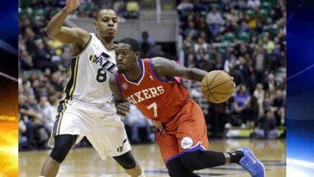 Philadelphia 76ers Royal Ivey (7) drives against Utah Jazzs Randy Foye (8) in the first quarter during an NBA basketball game Monday, March 25, 2013, in Salt Lake City. (AP Photo/Rick Bowmer)