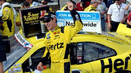 Joey Logano celebrates in Victory Lane after winning the NASCAR Nationwide Series auto race, Saturday, June 1, 2013, at Dover International Speedway in Dover, Del.