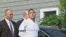 Patriots TE Aaron Hernandez taken from home in handcuffs