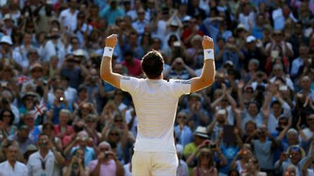 Andy Murray of Britain reacts after defeating Novak Djokovic of Serbia during the Mens singles final match at the All England Lawn Tennis Championships in Wimbledon, London, Sunday, July 7, 2013. (AP Photo/Kirsty Wigglesworth)