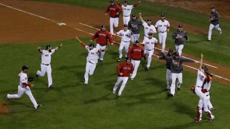 Boston Red Sox relief pitcher Koji Uehara jumps into David Rosss arms after defeating the St. Louis Cardinals in Game 6 of baseballs World Series Wednesday, Oct. 30, 2013, in Boston. The Red Sox won 6-1 to win the series. (AP Photo/Matt Slocum)