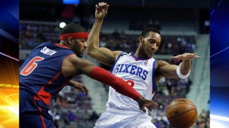 Detroit Pistons forward Josh Smith (6) steals the ball from Philadelphia 76ers forward Evan Turner during the first half of an NBA basketball game on Sunday, Dec. 1, 2013, in Auburn Hills, Mich. (AP Photo/Duane Burleson)