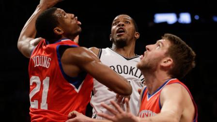 Brooklyn Nets Joe Johnson, center, Philadelphia 76ers Thaddeus Young, left, and Spencer Hawes look to grab a rebound during the first half of the NBA basketball game at the Barclays Center, Monday, Dec. 16, 2013, in New York. (AP Photo/Seth Wenig)
Brooklyn Nets Joe Johnson, center, Philadelphia 76ers Thaddeus Young, left, and Spencer Hawes look to grab a rebound during the first half of the NBA basketball game at the Barclays Center, Monday, Dec. 16, 2013, in New York. (AP Photo/Seth Wenig)