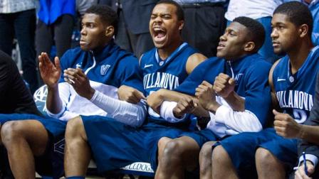 Villanovas Tony Chennault, second from left, ce;ebrates after teammate JayVaughn Pinkston (22) hits a free-throw late in the overtime of an NCAA college basketball game, Tuesday, Dec. 31, 2013, in Indianapolis. Villanova won 76-73. (AP Photo/Doug McSchooler)