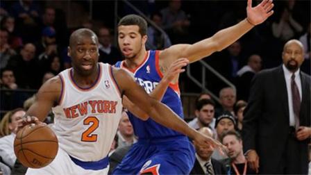 New York Knicks Raymond Felton (2) drives past Philadelphia 76ers Michael Carter-Williams (1) during the first half of an NBA basketball game, Wednesday, Jan. 22, 2014, in New York. (AP Photo/Frank Franklin II)