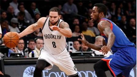 Brooklyn Nets point guard Deron Williams (8) drives around Philadelphia 76ers guard Tony Wroten (8) in the first half of their NBA basketball game at the Barclays Center, Monday, Feb. 3, 2014 in New York. (AP Photo/Kathy Willens)