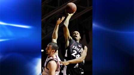 Temple forward Lavoy Allen (24) shoots over University of Pennsylvania forward Conor Turley in the first half of an NCAA college basketball game Wednesday, Jan. 13, 2010 in Philadelphia. (AP Photo/Michael Perez)