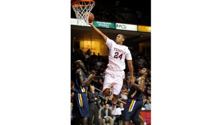 Lavoy Allen (24) of Temple drives through the Toledo defense during the first half of an NCAA college basketball game Sunday, Nov. 14, 2010, in Philadelphia. (AP Photo/Barbara Johnston)