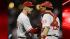 Philadelphia Phillies Cliff Lee, left, shakes...