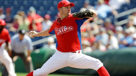 Philadelphia Phillies Roy Oswalt delivers a pitch against Baltimore Orioles during the first inning of a spring training baseball game on Wednesday, March 2, 2011, in Clearwater, Fla. (AP Photo/Eric Gay)