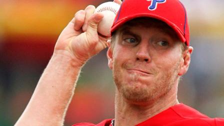 Philadelphia Phillies pitcher Roy Halladay throws in the first inning of a spring training baseball game against the New York Yankees in Clearwater, Fla., Thursday, March 10, 2011. (AP Photo/Gene J. Puskar)