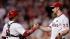 Philadelphia Phillies catcher Carlos Ruiz, left,...