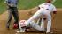 Philadelphia Phillies Chase Utley (26) is tagged...