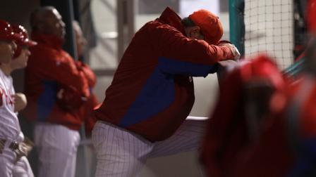 Philadelphia Phillies starting pitcher Roy Halladay reacts in the dugout during the eighth inning of baseballs Game 5 of the National League division series with the St. Louis Cardinals, Friday, Oct. 7, 2011, in Philadelphia. The Cardinals won 1-0. (AP Photo/Matt Rourke)