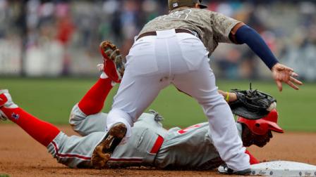 Philadelphia Phillies Juan Pierre is picked off of first as San Diego Padres first baseman Yonder Alonso makes the tag in the first inning of a baseball game Sunday, April 22, 2012 in San Diego. (AP Photo/Lenny Ignelzi)