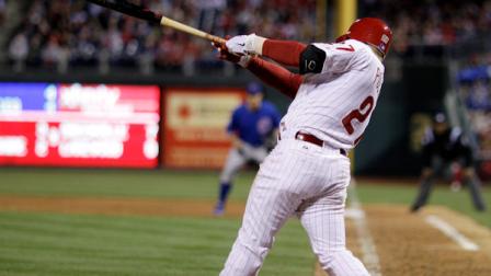 Philadelphia Phillies Placido Polanco follows through on a two-run double off Chicago Cubs starting pitcher Rafael Dolis in the eighth inning of a baseball game, Monday, April 30, 2012, in Philadelphia. Philadelphia won 6-4. (AP Photo/Matt Slocum)