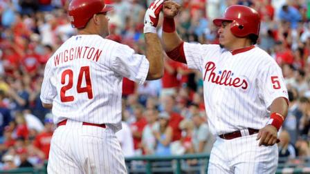 Philadelphia Phillies Carlos Ruiz greets Ty Wiggington after he hit a two-run home run against the Pittsburgh Pirates in the third inning of a baseball game, Tuesday, June 26, 2012, in Philadelphia. (AP Photo/Michael Perez)