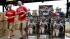 Fans walk past a stack of Hunter Pence...