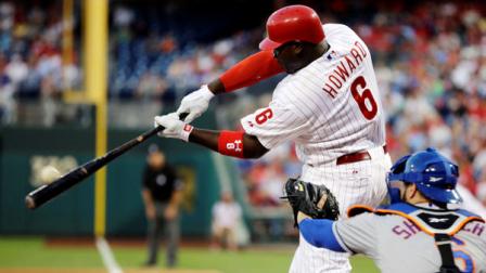 Philadelphia Phillies Ryan Howard hits a grand slam off New York Mets starting pitcher Chris Young in the first inning of a baseball game, Tuesday, Aug. 28, 2012, in Philadelphia. At right is catcher Kelly Shoppach. (AP Photo/Matt Slocum)