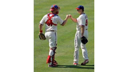 Philadelphia Phillies Jonathan Papelbon, right celebrates with catcher Erik Kratz after defeating the New York Mets 3-2 in a baseball game Thursday, Aug. 30, 2012, in Philadelphia. (AP Photo/H. Rumph Jr)