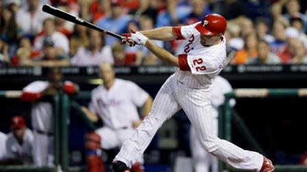 Philadelphia Phillies Nate Schierholtz follows through after hitting the game-winning RBI-single off Colorado Rockies relief pitcher William Harris in the ninth inning of a baseball game, Friday, Sept. 7, 2012, in Philadelphia. Philadelphia won 3-2. (AP Photo/Matt Slocum)