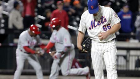 New York Mets relief pitcher Josh Edgin looks down as Philadelphia Phillies Ryan Howard runs the bases after hitting a grand slam during the ninth inning of a baseball game Thursday, Sept. 20, 2012, in New York. The Phillies won 16-1. (AP Photo/Frank Franklin II)