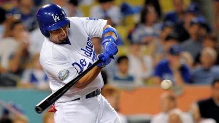 Los Angeles Dodgers Shane Victorino swings on a three-run home run during the second inning of a baseball game against the Colorado Rockies, Friday, Sept. 28, 2012, in Los Angeles. (AP Photo/Mark J. Terrill)