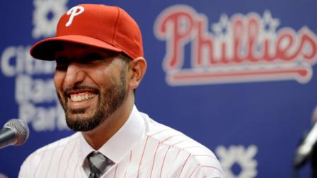 Philadelphia Phillies new relief pitcher Mike Adams smiles during a baseball news conference Thursday, Dec. 20, 2012, in Philadelphia. The Phillies agreed to a two-year contract with the 34-year-old right-hander. (AP Photo/Matt Rourke)