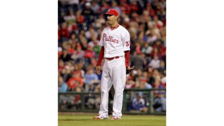 Philadelphia Phillies pitcher Mike Adams stands on the mound after St. Louis Cardinals Carlos Beltran hit a solo home run in the eight inning of a baseball game on Thursday, April 18, 2013, in Philadelphia. The Cardinals won 4-3. (AP Photo/H. Rumph Jr)