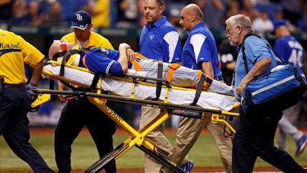 Toronto Blue Jays starting pitcher J.A. Happ is taken off the field on a stretcher after being hit with a line drive off the bat of Tampa Bay Rays Desmond Jennings during the second inning of a baseball game Tuesday, May 7, 2013, in St. Petersburg, Fla. (AP Photo/Mike Carlson)