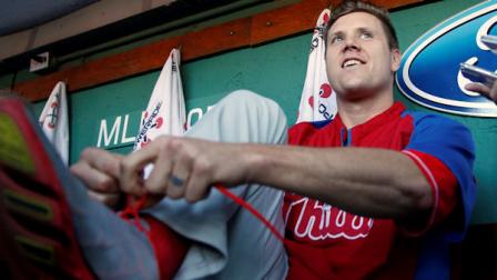 Philadelphia Phillies Jonathan Papelbon laces his shoes while talking with reporters before a baseball game against the Boston Red Sox in Boston, Monday, May 27, 2013. (AP Photo/Michael Dwyer)