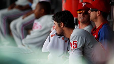 Philadelphia Phillies starting pitcher Cole Hamels tries to cool off in the dugout after retiring the Colorado Rockies in the fourth inning of a baseball game in Denver on Sunday, June 16, 2013. (AP Photo/David Zalubowski)